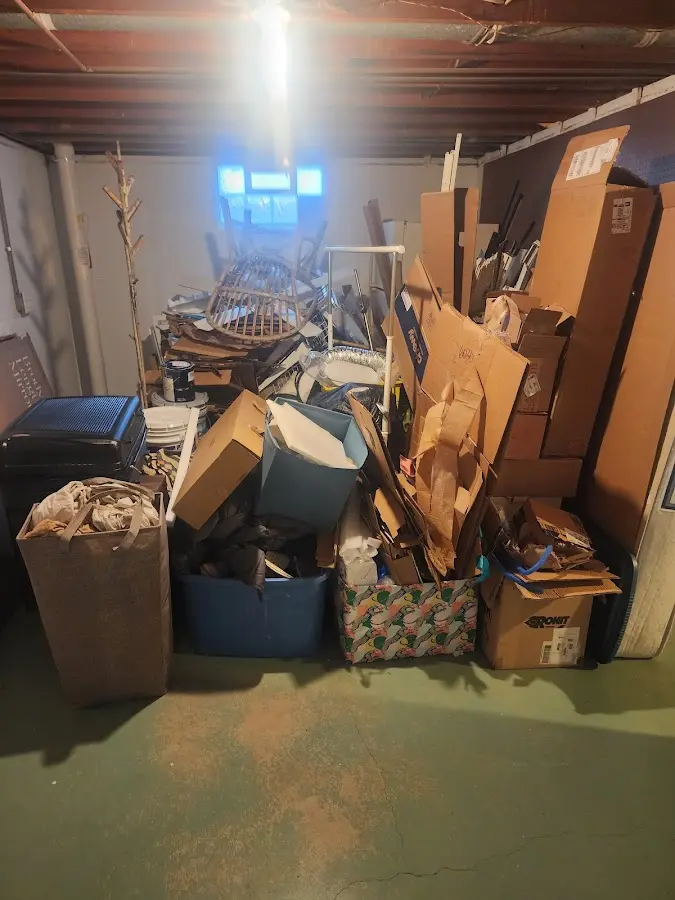 Roll-off dumpster container at job site for 2 Yard Dumpster Rental in Moyock